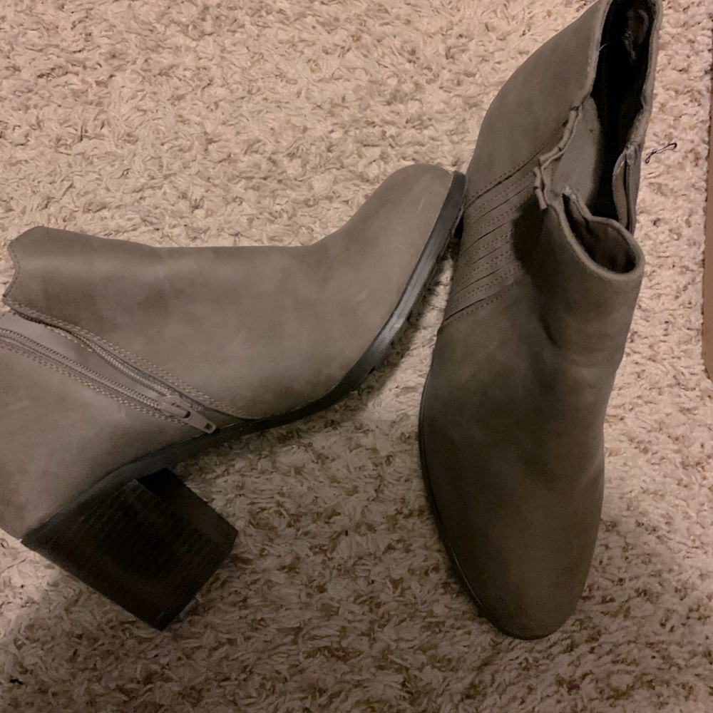 Women side zip booties. The color is gray.